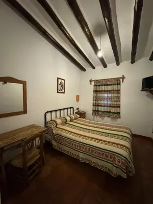 Cama o camas de una habitación en Posada de Jose Mª El Tempranillo