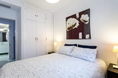 Cama o camas de una habitación en LR2 Private Terrace & Parking Right in the city Center