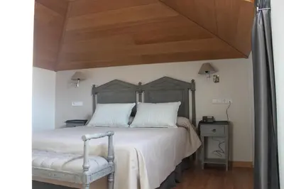 Cama o camas de una habitación en Hotel Villa Maria