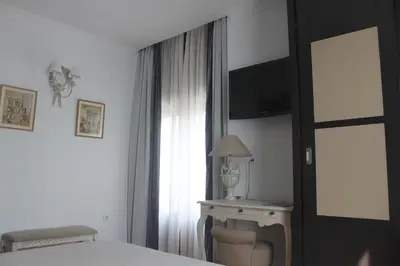 Cama o camas de una habitación en Hotel Villa Maria
