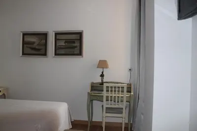 Cama o camas de una habitación en Hotel Villa Maria