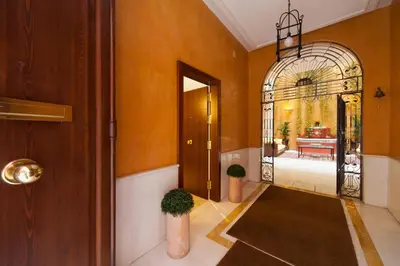 Cama o camas de una habitación en Logia Sevilla