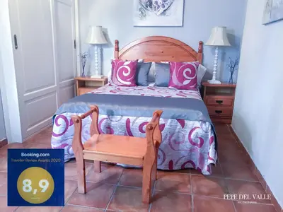 Cama o camas de una habitación en Los patios “ El Carmen”