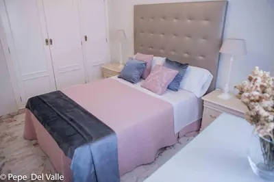 Cama o camas de una habitación en Los patios “ El Carmen”
