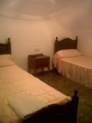Cama o camas de una habitación en Hostal Medina