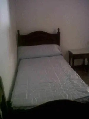 Cama o camas de una habitación en Hostal Medina