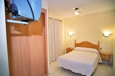 Cama o camas de una habitación en Hostal Restaurante Hermanos Zamora