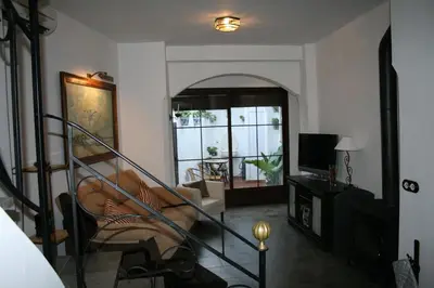 Una televisión o centro de entretenimiento en Casa Rural Villalta