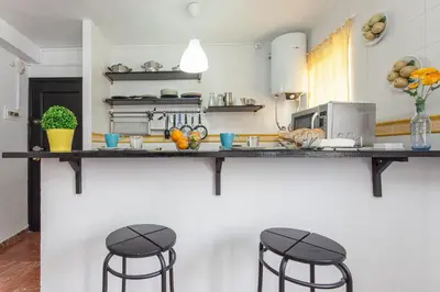 Una cocina o zona de cocina en Acogedor apartamento centro Castellar alto