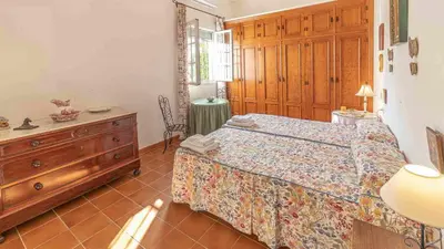 Cama o camas de una habitación en Casa Rural Santa Ana