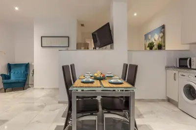 Una cocina o zona de cocina en Acogedor apartamento centro Sevilla San Marcos