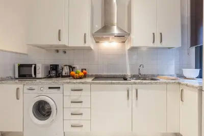 Una cocina o zona de cocina en Acogedor apartamento centro Sevilla San Marcos