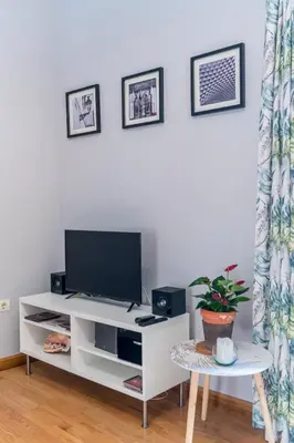 Una televisión o centro de entretenimiento en Apartamento Deluxe Terrace. Alameda
