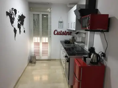 Una cocina o zona de cocina en Selecta Apartamento con piscina en Calle Juzgado
