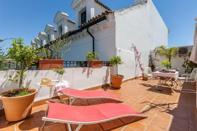 Un balcón o terraza de Apartamentos Plaza Pilatos