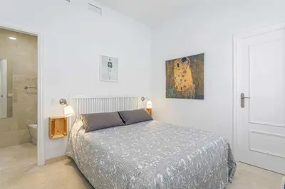 Cama o camas de una habitación en Santa Cruz Parking incluido