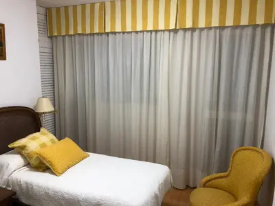 Cama o camas de una habitación en Alojamiento Ronda de los Tejares