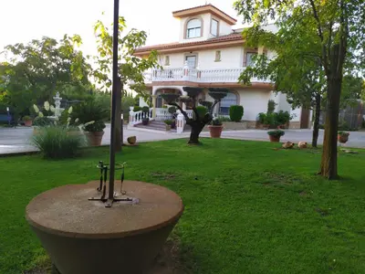 Jardín al aire libre en Vivienda Turística Rural Mari Carmen