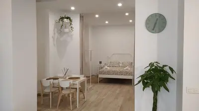 Cama o camas de una habitación en Suites Jeronimo de Cordoba