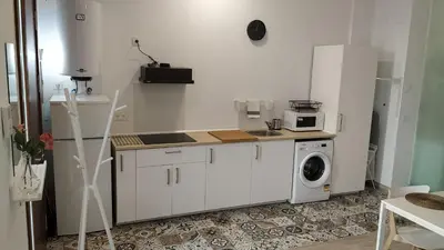 Una cocina o zona de cocina en Suites Jeronimo de Cordoba