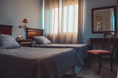 Cama o camas de una habitación en La Morona Hotel