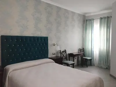Cama o camas de una habitación en La Morona Hotel