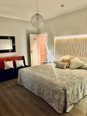 Cama o camas de una habitación en La Morona Hotel