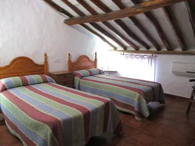 Cama o camas de una habitación en Casa Rural Dolores
