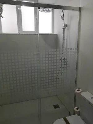 Un baño de Apartamentos Las Palmeras