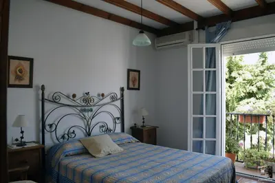 Cama o camas de una habitación en Casa Rural El Puente