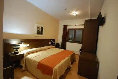 Cama o camas de una habitación en Hotel Hospederia San Francisco
