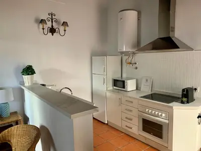 Una cocina o zona de cocina en Apartamentos Los Patios de la Judería