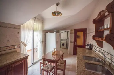 Una cocina o zona de cocina en LA ATALAYA GREAT LUXURY ATTIC