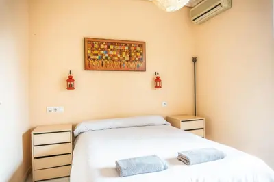 Cama o camas de una habitación en Buhaira Apartment