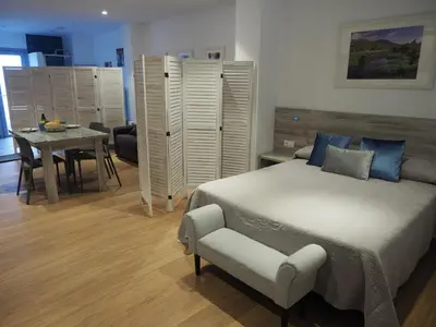 Cama o camas de una habitación en Ardales Loft