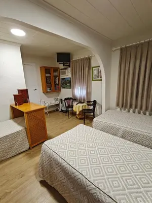 Cama o camas de una habitación en Alojamiento la Casa del Brigadier