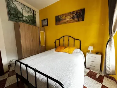 Cama o camas de una habitación en Santa Isabel Low Cost Rooms in private house