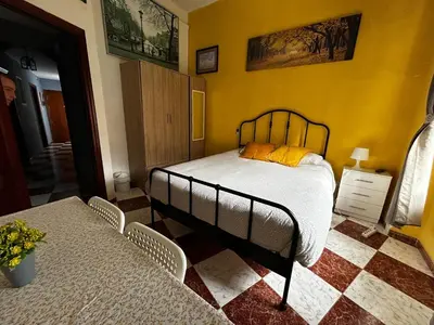 Cama o camas de una habitación en Santa Isabel Low Cost Rooms in private house