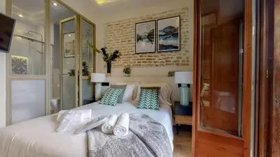 Cama o camas de una habitación en Bright and new- 2Bd 2Bth- Conde de Torrejon