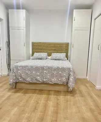 Cama o camas de una habitación en Estudio a 400 metros Ribera FREE PARKING