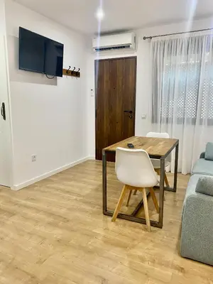Una televisión o centro de entretenimiento en Estudio a 400 metros Ribera FREE PARKING