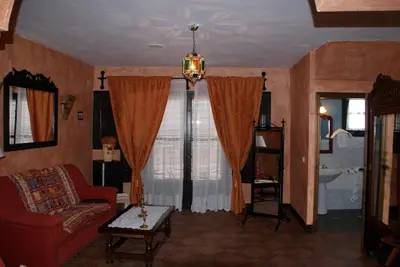 Cama o camas de una habitación en Hotel Palacio Guzmanes