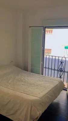 Cama o camas de una habitación en Ático céntrico