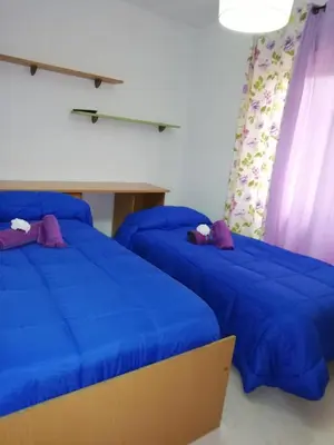 Cama o camas de una habitación en Casa Loli