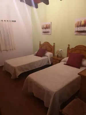Cama o camas de una habitación en CASA RURAL LA DEHESILLA