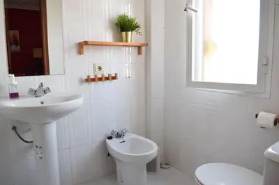 Un baño de Apartamento frente a Palacio de Congresos (Fibes)