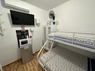 Cama o camas de una habitación en CASA SUR APARCAMIENTO GRATIS