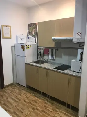 Una cocina o zona de cocina en CASA SUR APARCAMIENTO GRATIS