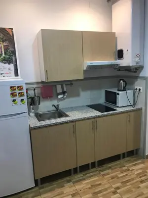 Una cocina o zona de cocina en CASA SUR APARCAMIENTO GRATIS