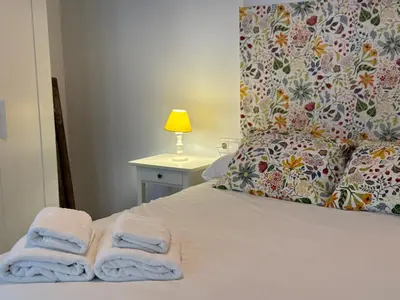 Cama o camas de una habitación en Loft Azahar junto a Puente Romano
